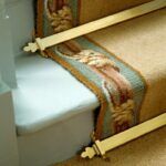 Beaumont triangular stair rod on bordered stair runner