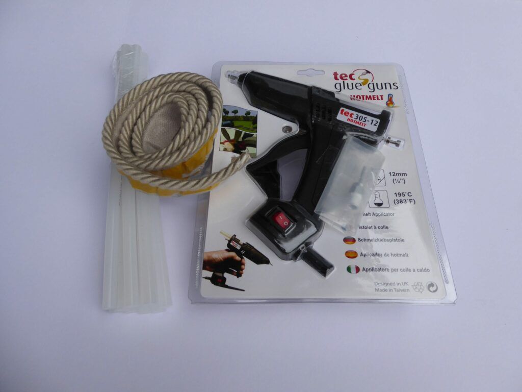 Easybind glue gun with glue sticks & sample Easybind strips