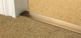 Button to shop for door thresholds and carpet door bars