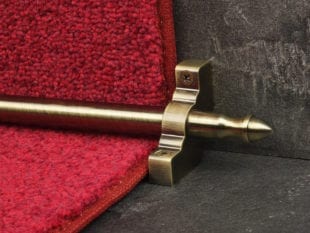Acorn ended Homepride stair rod on red carpet antique finish