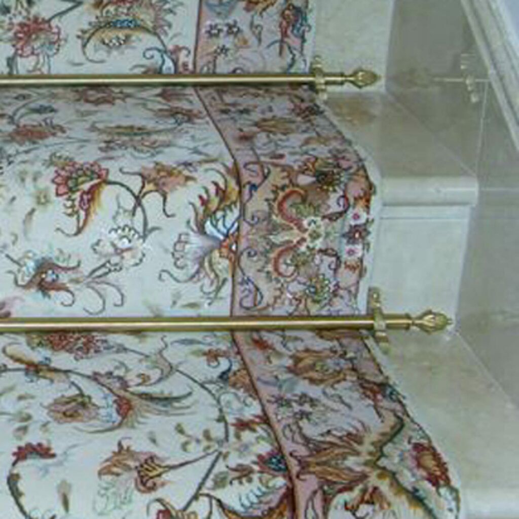 Carpet runner rails for wider staircases