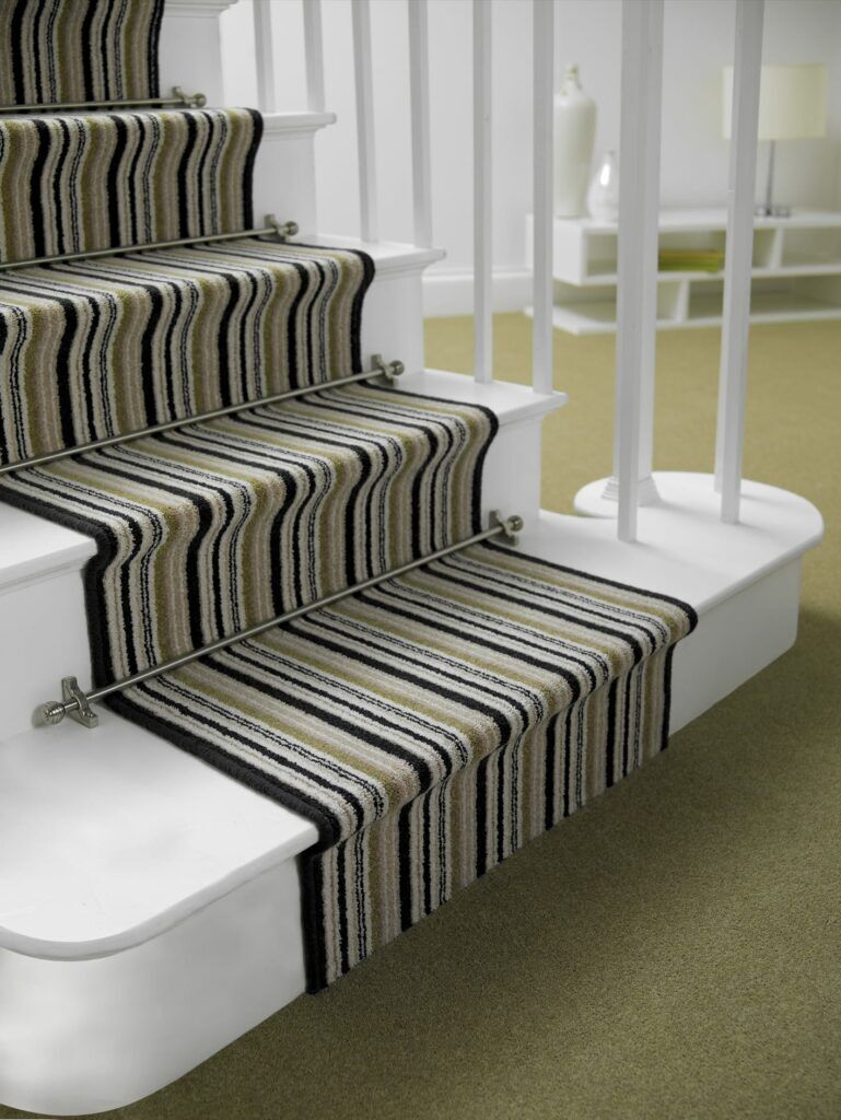Sphere stair rods in pewter fitted on striped runner carpet
