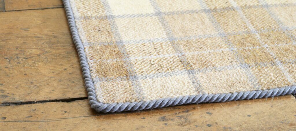 carpet edging - Easybind tartan rug trimmed in Grey Dunn