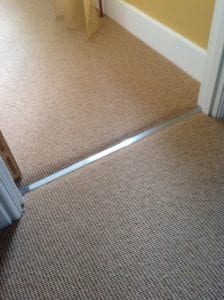 Feline 2 luxury door threshold in nisheen finish, joins carpet to carpet