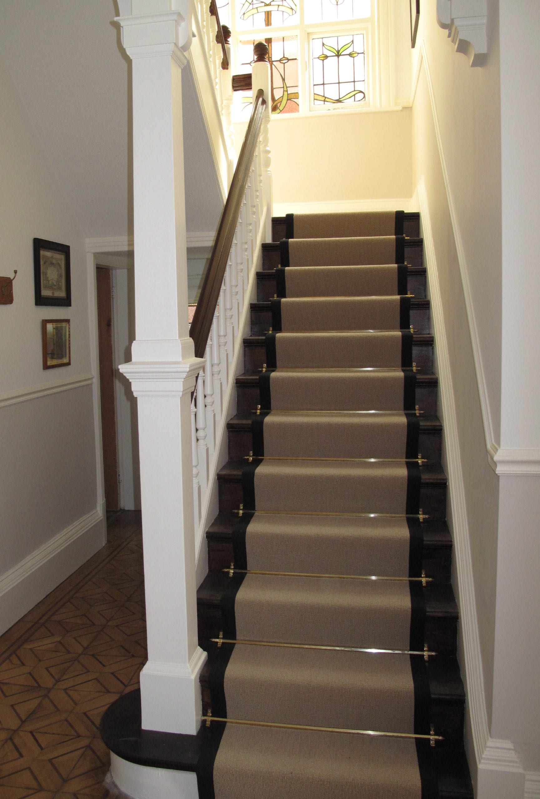 Town house staircase fitted with Hanover solid brass STAIR CARPET RODS