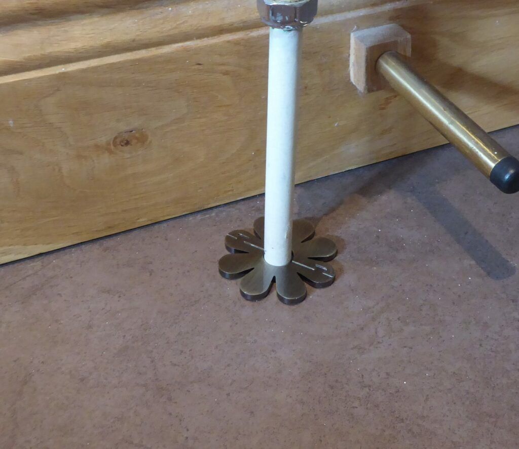 Floret radiator Pipe collar featuring petals to cover up hole around pipes in floor