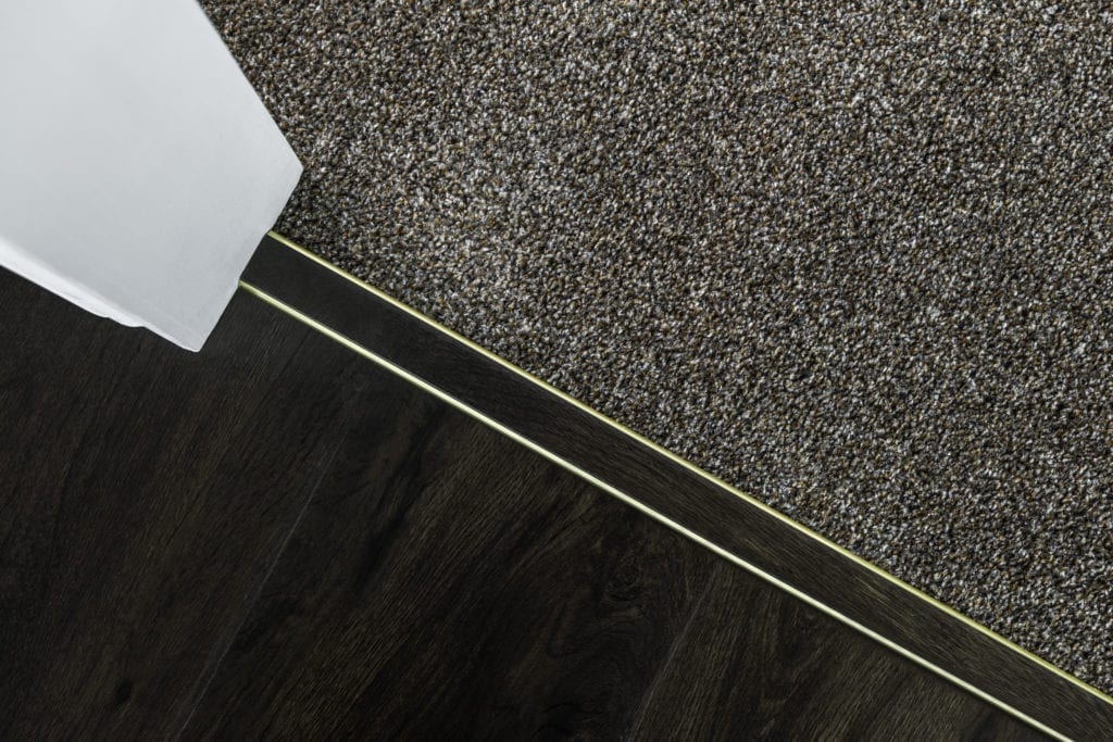 laminate and vinyl door strips for joining to carpet