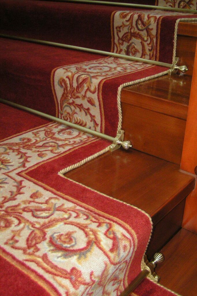 Carpet edging - Easybind fitted to red stair runner